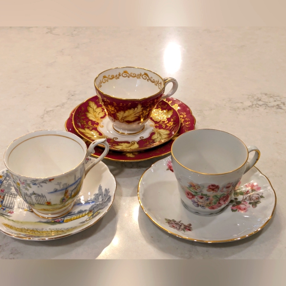 It's a set of 7 but all pieces are by different companies. 3 teacups, 3 saucers,